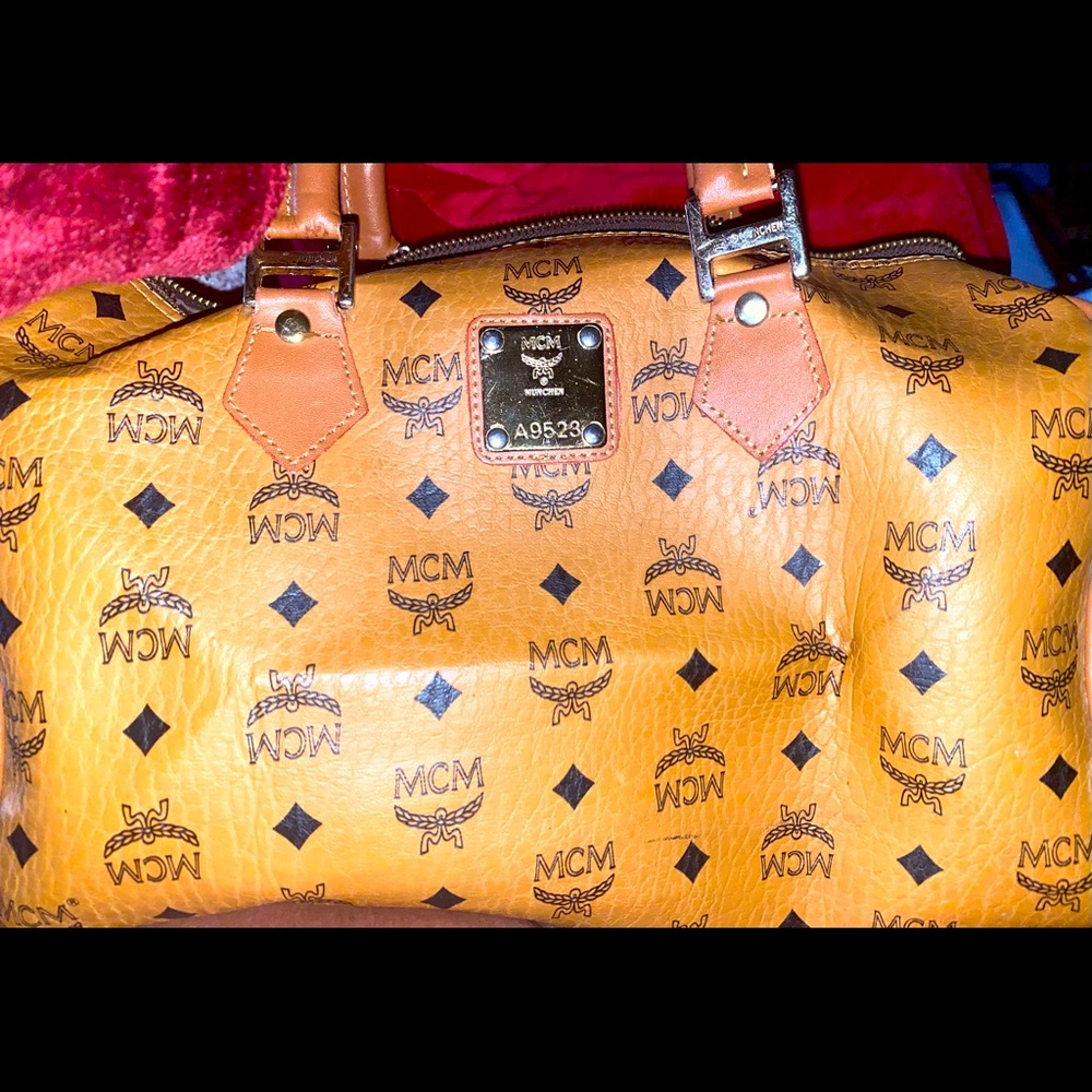 Authentic MCM bag with keys. Slight creasing from being folded when storage.